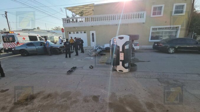 Vuelca unidad de transporte de valores tras choque al omitir un alto