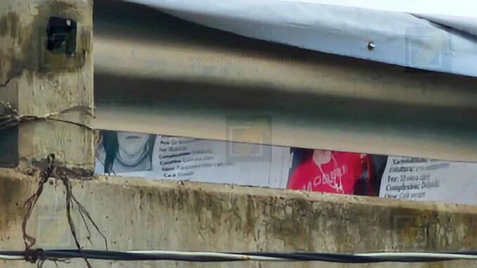 Colocan mantas con rostros de desaparecidos y movilizan a la policía